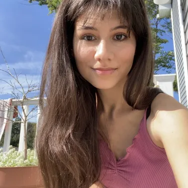 Gloria Parrales ’24 smiles at the camera