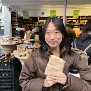  Reimy Liou ‘24 in a cheese shop