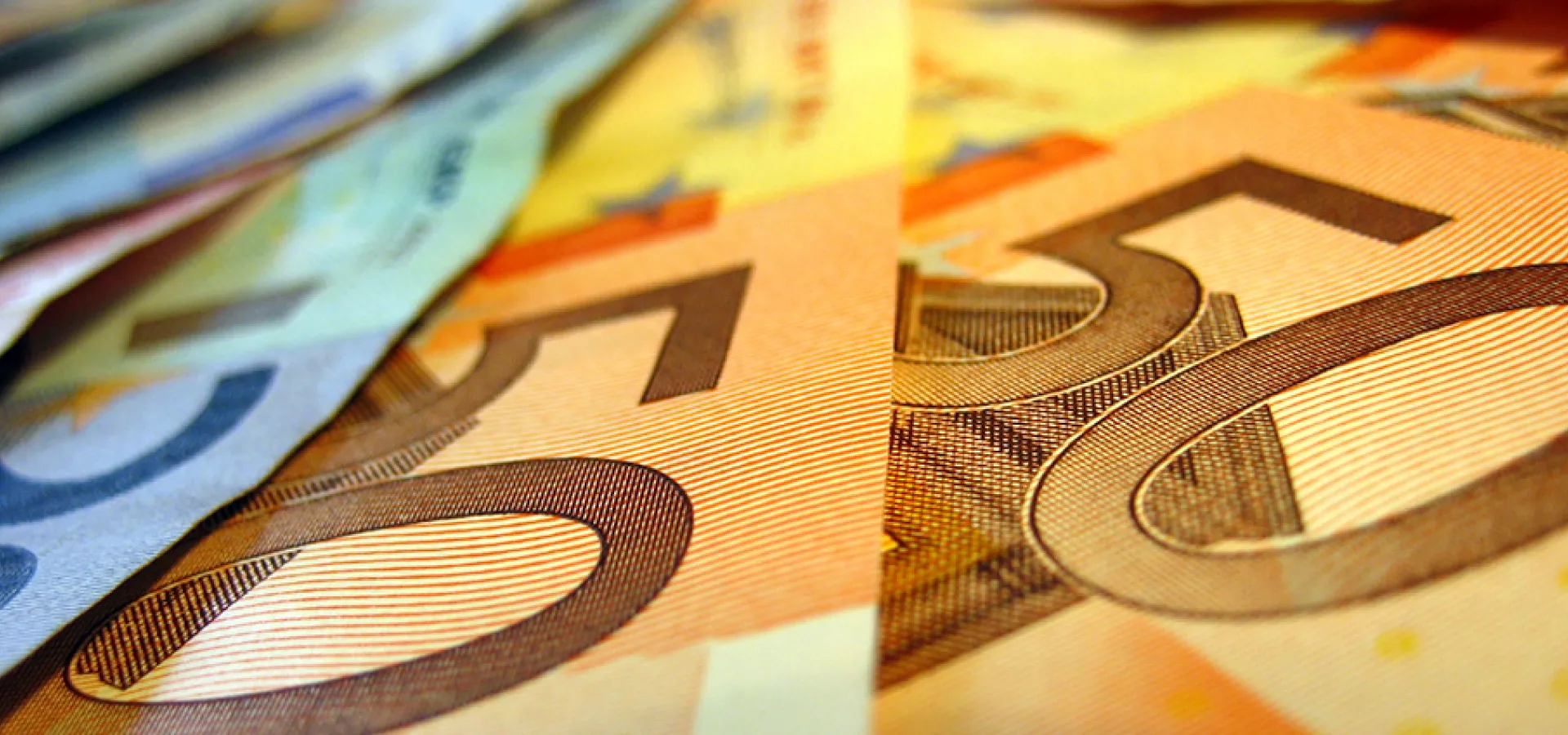 Closeup photo of a range of euro notes