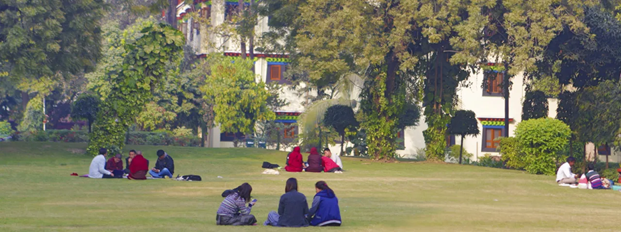 Students on a lawn in India