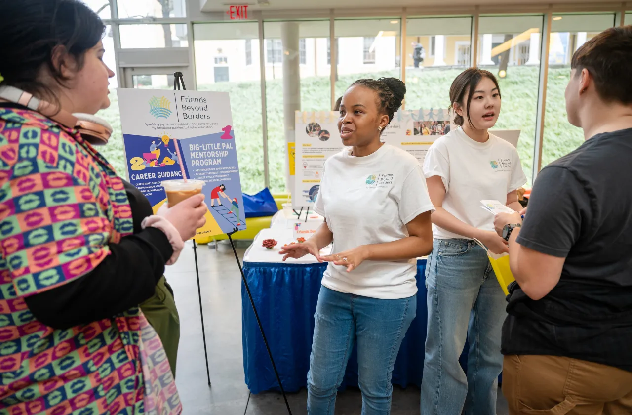 Students discuss their project during Joyapalooza