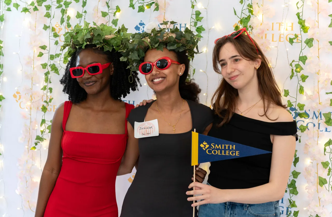 Students posing for a picture at the Senior Soiree photo booth.