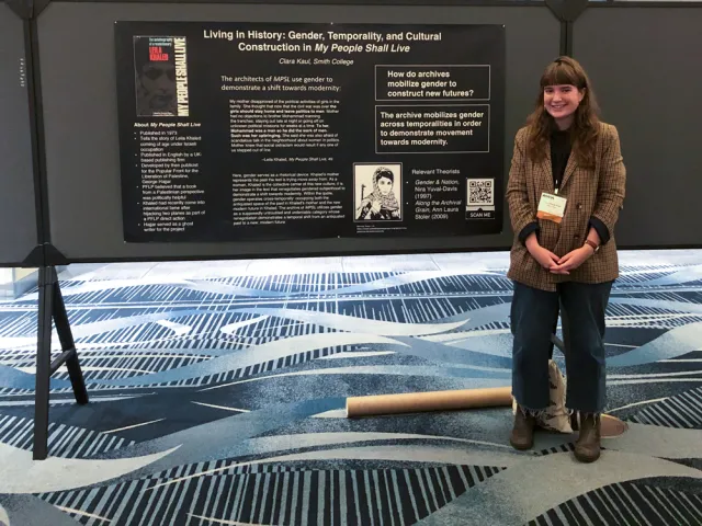 Clara Kaul in front of her SWG poster