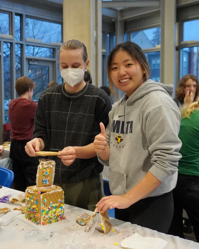 Engineering students building gingerbread skyscrapers