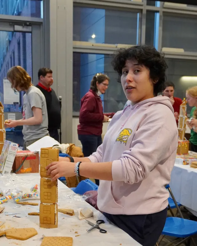 Engineering students building gingerbread skyscrapers