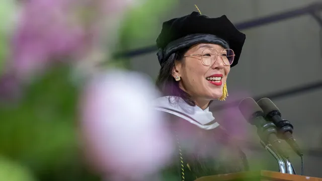 Ai-jen Poo speaking at Commencement