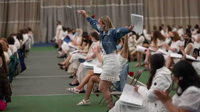 student celebrating an Ivy Day award