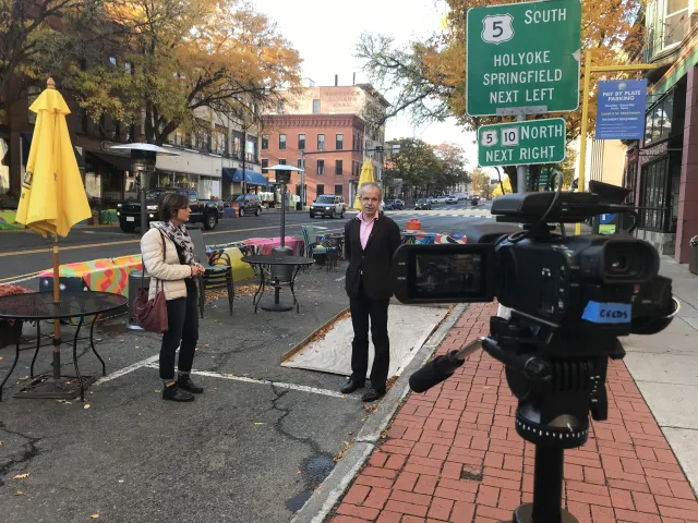 Maria Succi-Hempstead and Frank Sleegers in downtown Northampton, recording a film dialouge