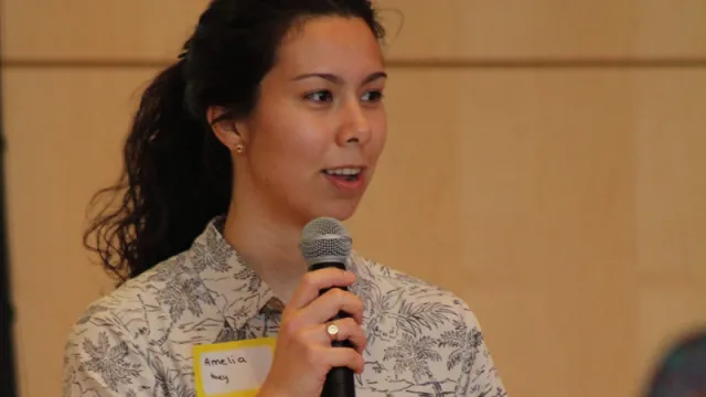 Amelia Windorski speaking into a microphone