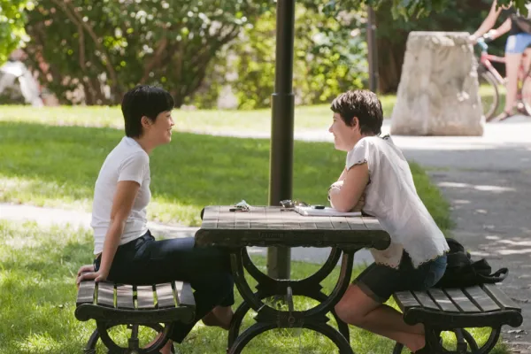 two people at a picnic table