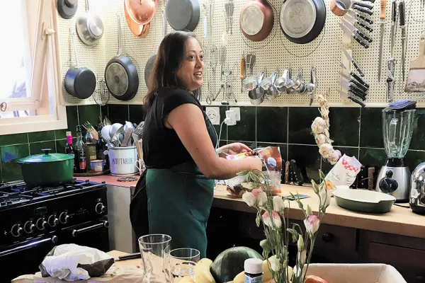 Shaila Manyam 94 cooking in Julia Child’s kitchen