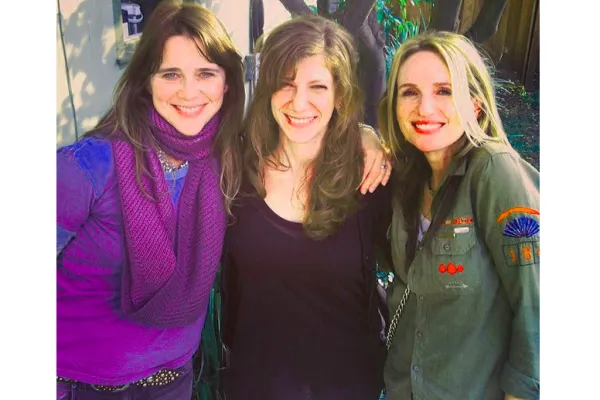 Tanya Pearson flanked by members of the band Veruca Salt