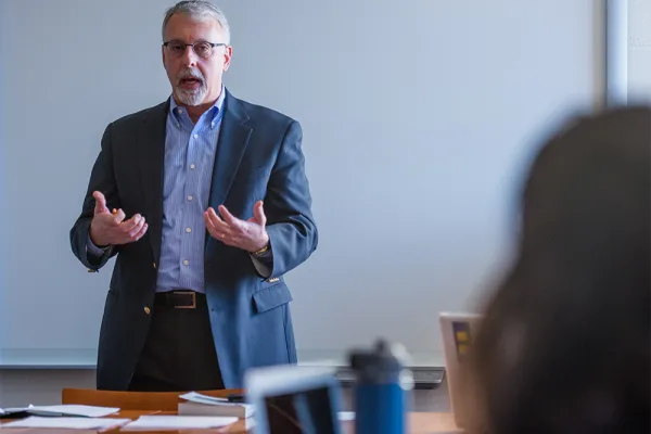 Steve Heydemann lectures in front of a class