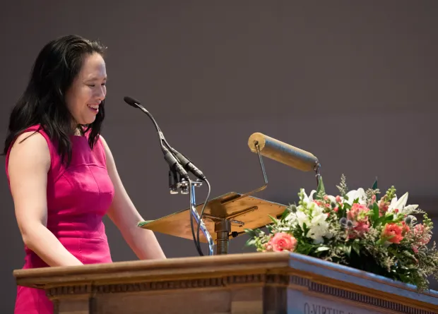 Carolyn Kuan ’99 accepting a Smith College Medal at Rally Day in 2019.