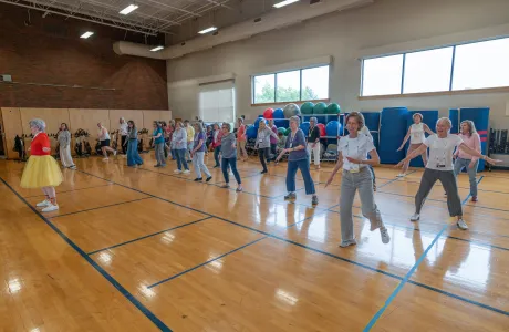 Smithies take part in an exercise class during Reunion II