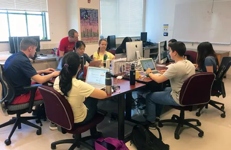 Students in a computer science classroom