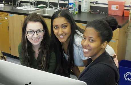 Three neuroscience students in the lab