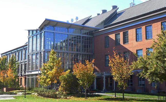 Exterior shot of Ford Hall in the fall