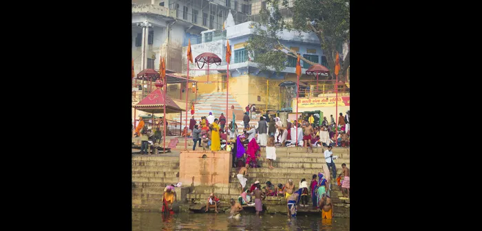 People alongside the Ganga River