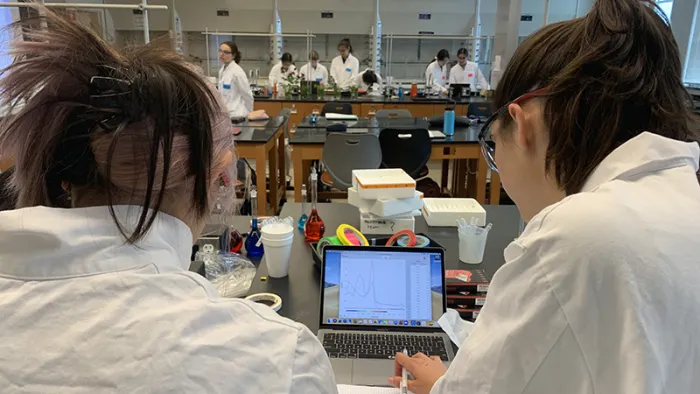Two students in the lab for the summer science precollege program 