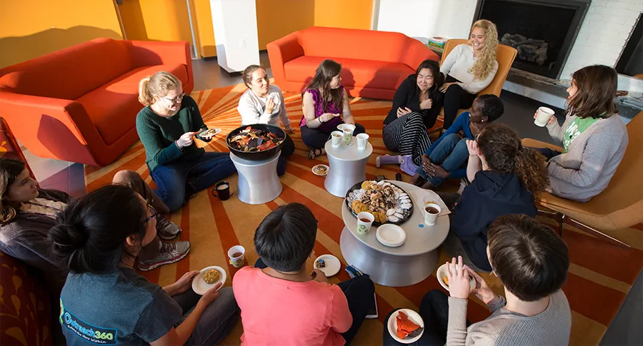 Group of students having tea and snacks