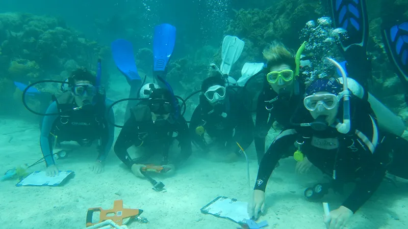 Students scuba diving as part of the Coral Reef Ed-Ventures Program